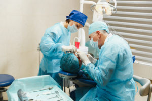 dentists performing oral surgery