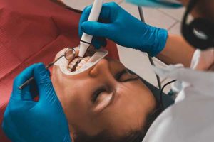 woman learning about periodontics 