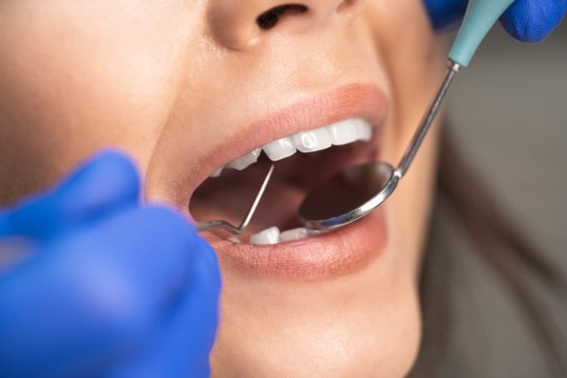 patient being worked on at dental appointment