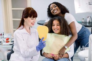 family learning about pediatric dentistry